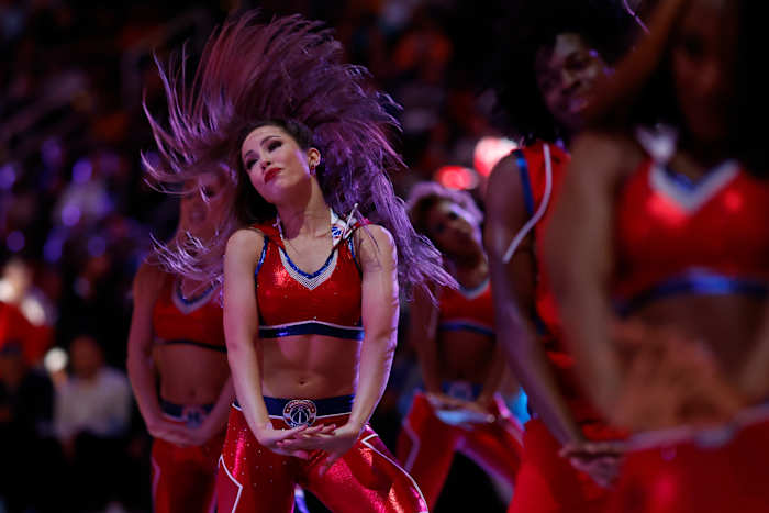 Members of the Washington Wizards Dancers dance during a timeout against the Dallas Mavericks in the second quarter at Capital One Arena.